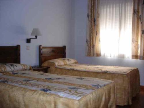 Hostal Cruz Verde 나발카르네로 객실 사진